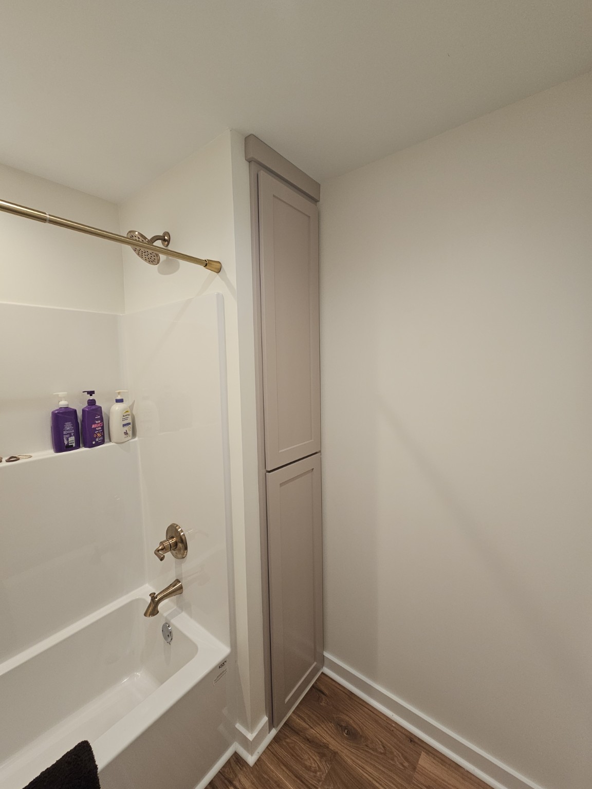 Built-in linen storage by Hilltop Cabinets LLC