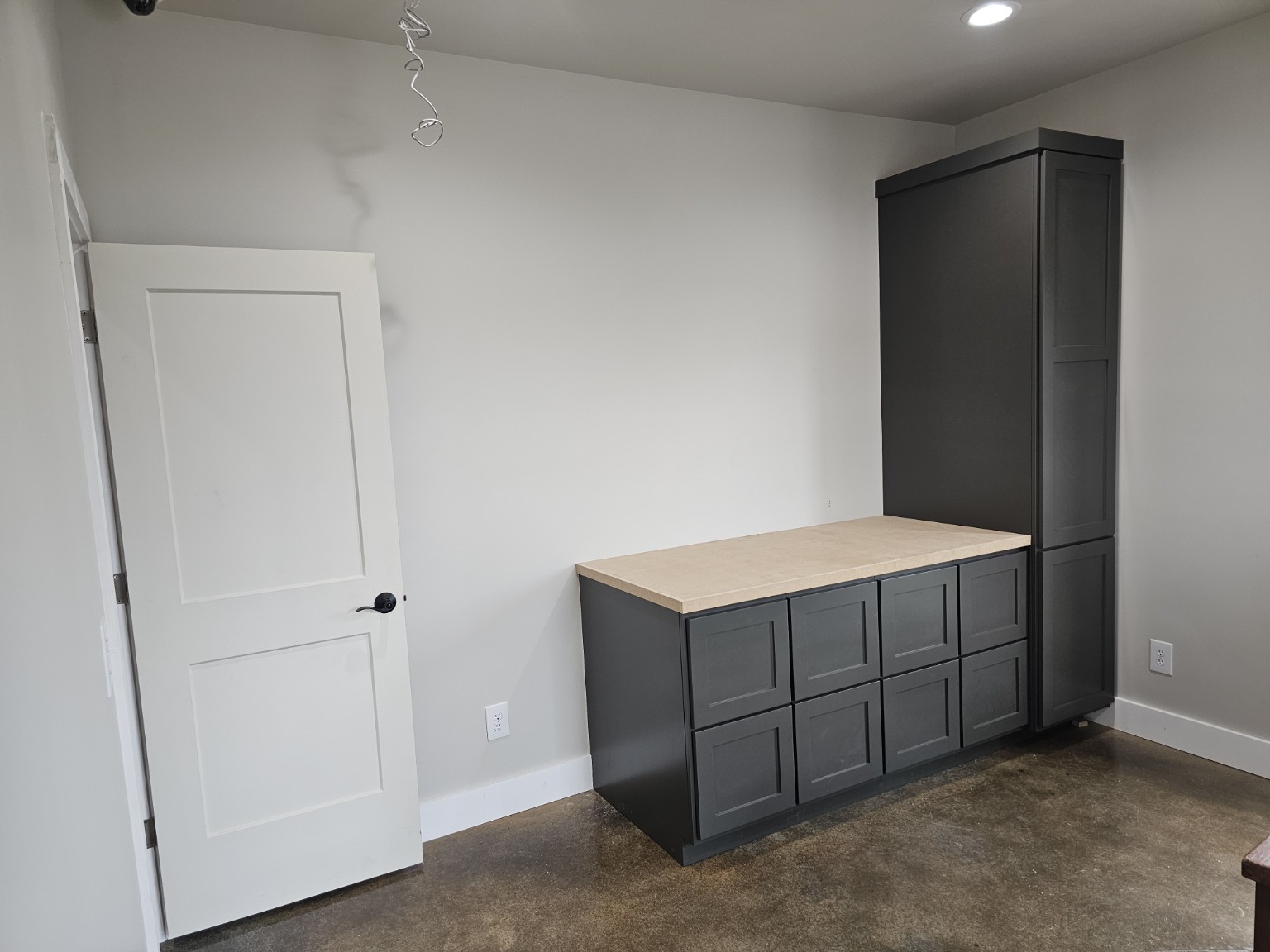 File drawers and blueprint sized counter by Hilltop Cabinets LLC